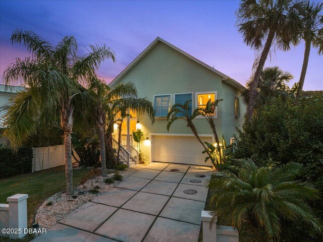 3110 John Anderson Dr, Ormond Beach, FL 32176 - view of front of house with a garage