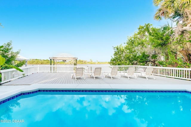 3110 John Anderson Dr, Ormond Beach, FL 32176 - view of pool with a gazebo and a wooden deck