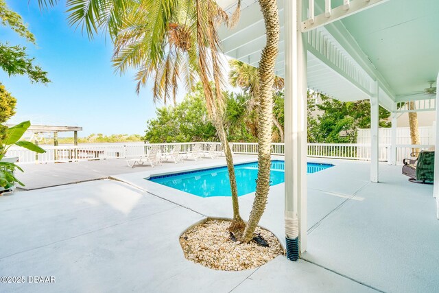 3110 John Anderson Dr, Ormond Beach, FL 32176 - view of pool with ceiling fan and a patio area