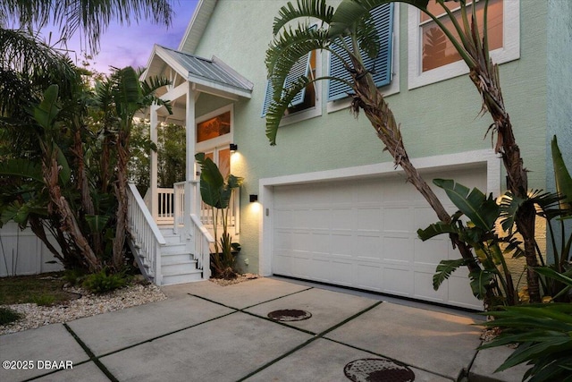 3110 John Anderson Dr, Ormond Beach, FL 32176 - view of front of home with a garage