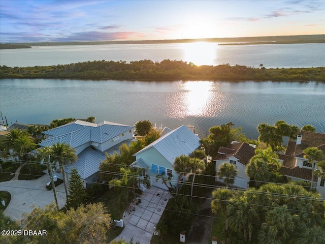 3110 John Anderson Dr, Ormond Beach, FL 32176 - aerial view at dusk featuring a water view