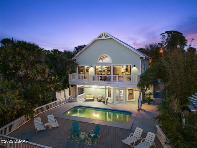 3110 John Anderson Dr, Ormond Beach, FL 32176 - exterior space with a wooden deck, outdoor lounge area, and a patio