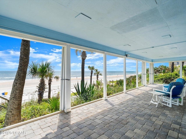 2833 S Atlantic Ave, Daytona Beach, FL 32118 - sunroom / solarium featuring view of water and beach