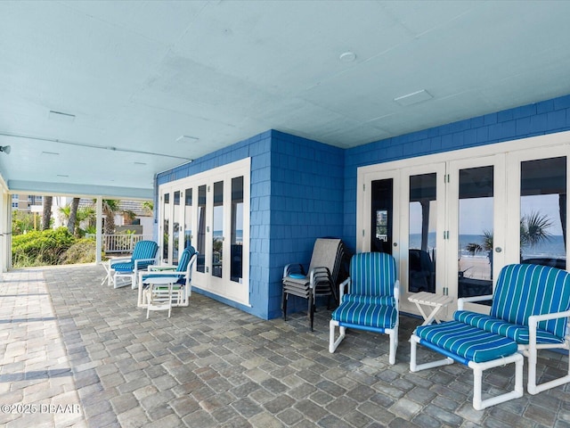 2833 S Atlantic Ave, Daytona Beach, FL 32118 - view of patio / terrace with french doors