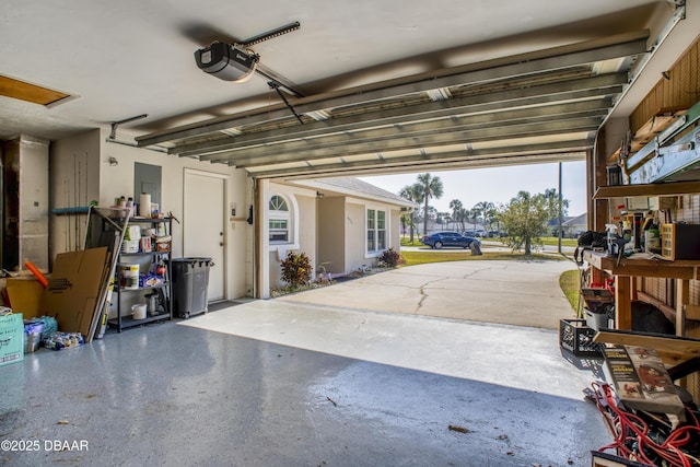 garage featuring a garage door opener