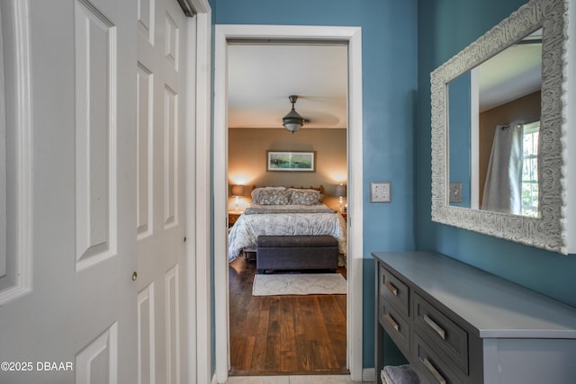 bedroom with hardwood / wood-style floors