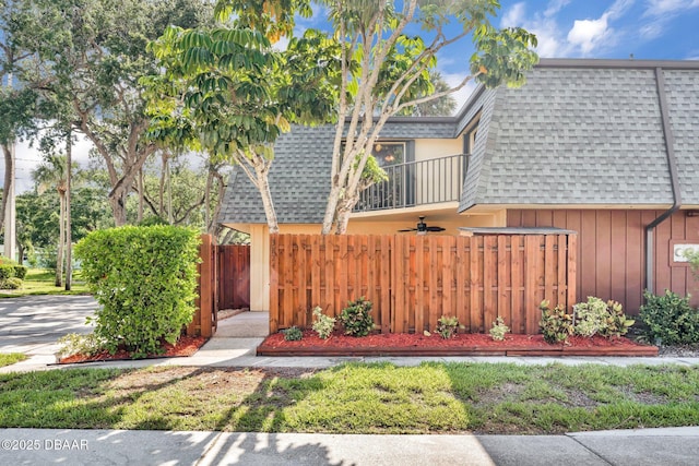 3824 Saxon Dr, New Smyrna Beach, FL 32169 - view of front of home with roof with shingles and mansard roof