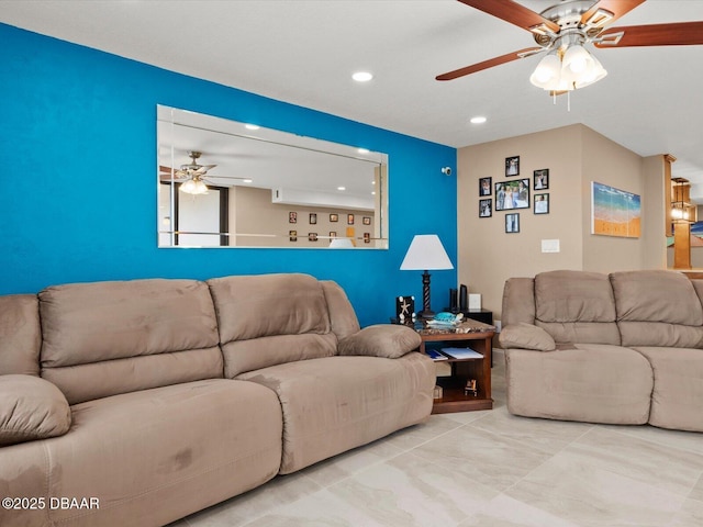 living room featuring ceiling fan