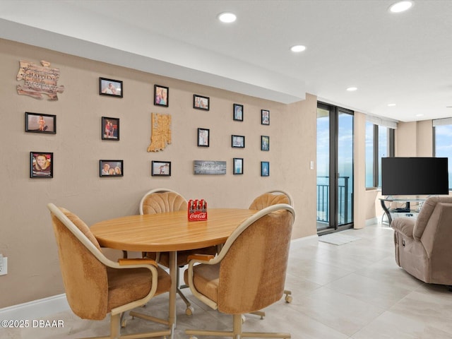 dining space with expansive windows