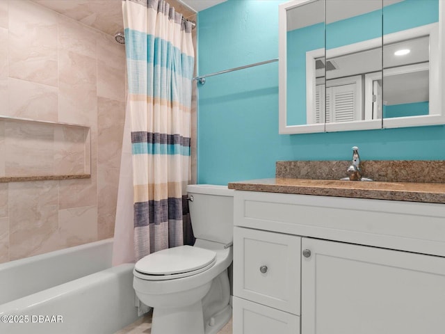 full bathroom with shower / bath combination with curtain, vanity, and toilet