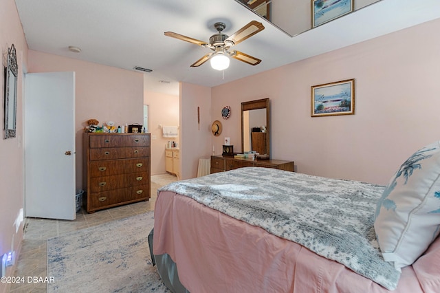 bedroom with connected bathroom and ceiling fan