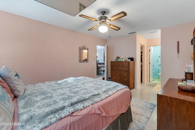 bedroom featuring ceiling fan and connected bathroom