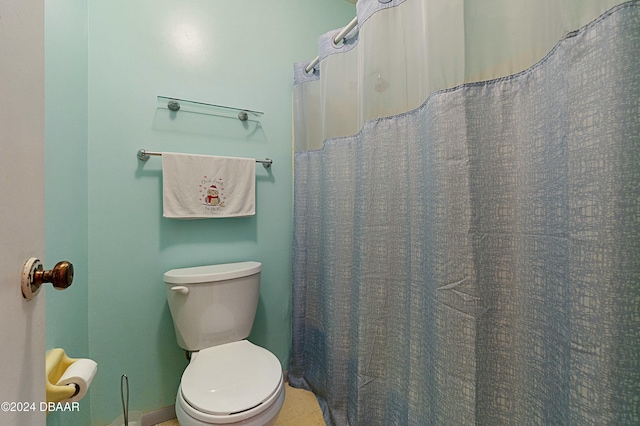 bathroom featuring toilet