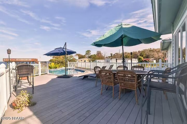 21951 Tarragona Way, Astor, FL 32102 - deck with outdoor dining space