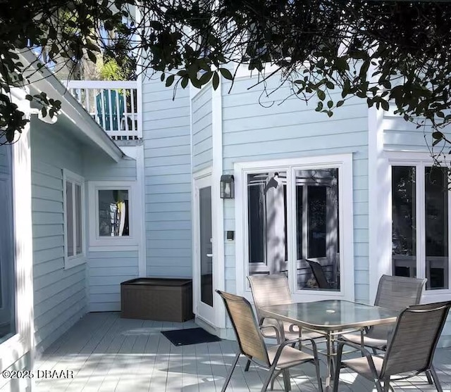 21951 Tarragona Way, Astor, FL 32102 - deck with outdoor dining space