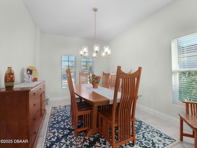 dining area with a notable chandelier