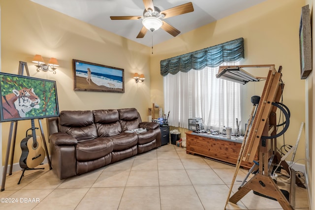 living room featuring ceiling fan and light tile patterned floors