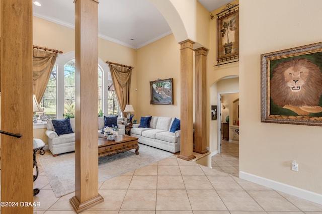 interior space featuring ornamental molding and ornate columns