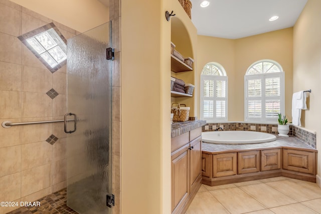 bathroom featuring tile patterned flooring and plus walk in shower