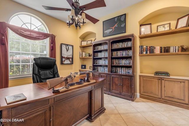 tiled home office featuring ceiling fan