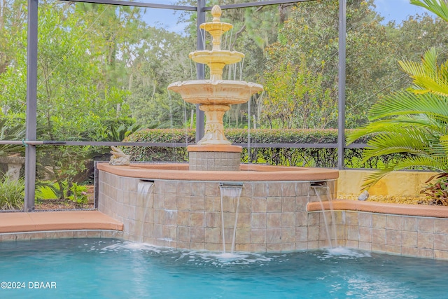 view of pool featuring pool water feature