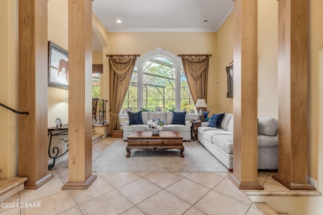 living room featuring ornamental molding and light tile patterned flooring