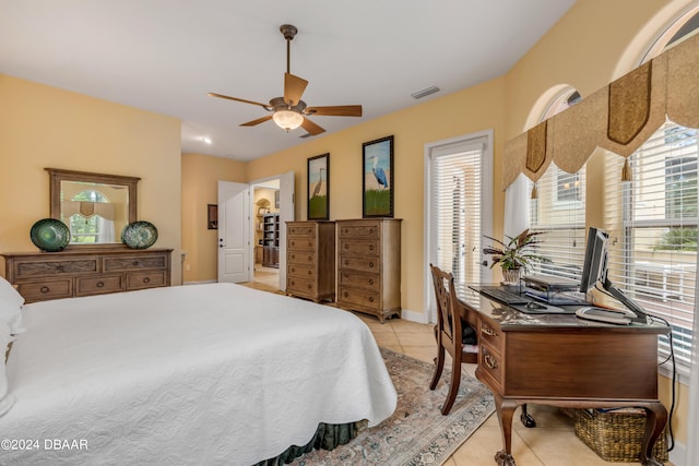 bedroom featuring ceiling fan and light tile patterned floors