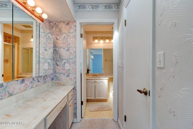130 Kimberly Dr, Ormond Beach, FL 32174 - bathroom with wallpapered walls and vanity
