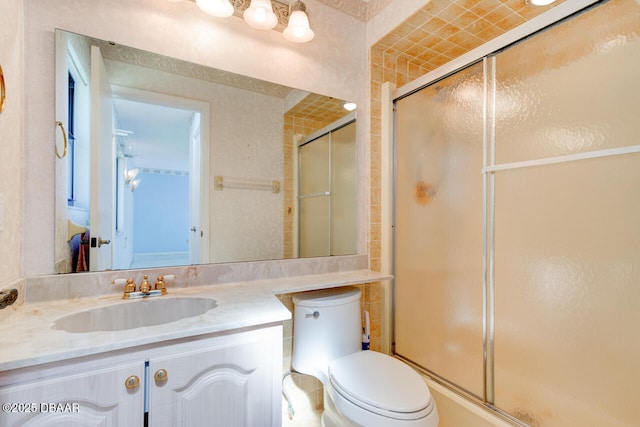 130 Kimberly Dr, Ormond Beach, FL 32174 - full bathroom with toilet, vanity, and a shower with door