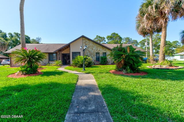 130 Kimberly Dr, Ormond Beach, FL 32174 - mid-century modern home featuring a front lawn and stone siding
