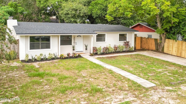 1512 Old Kings Rd, Daytona Beach, FL 32117 - ranch-style home featuring a front lawn