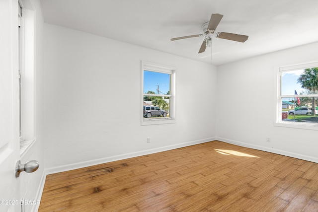 408 Frances Ter, Daytona Beach, FL 32118 - empty room featuring ceiling fan, plenty of natural light, baseboards, and light wood-style flooring