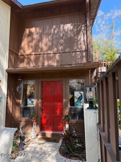 doorway to property with fence