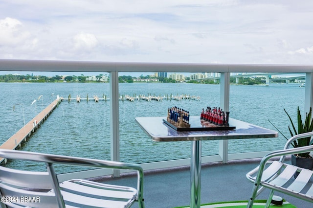241 Riverside Dr Unit 402, Daytona Beach, FL 32117 - balcony with a water view and a dock