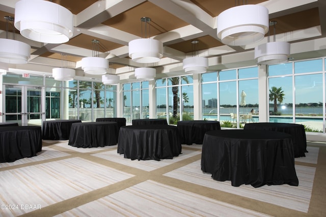241 Riverside Dr Unit 402, Daytona Beach, FL 32117 - community lobby with coffered ceiling and a water view