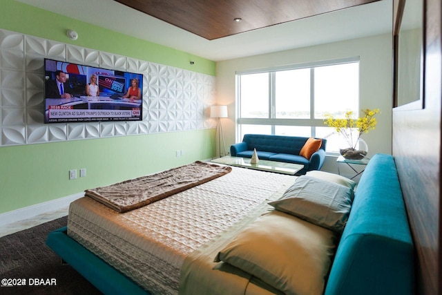 241 Riverside Dr Unit 402, Daytona Beach, FL 32117 - bedroom featuring baseboards