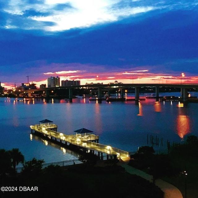 241 Riverside Dr Unit 402, Daytona Beach, FL 32117 - water view featuring a notable bridge and a boat dock