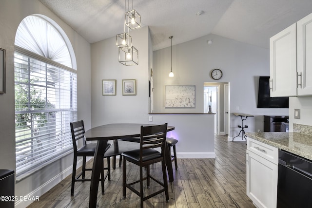 dining area with baseboards, dark wood-style floors, and vaulted ceiling