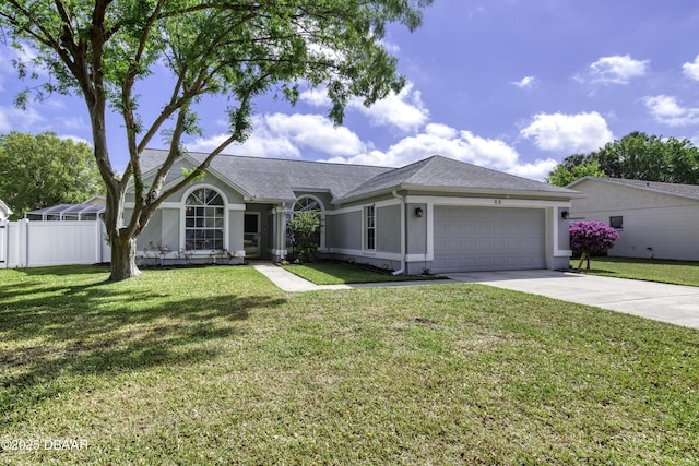 single story home featuring fence, a garage, concrete driveway, a front lawn, and stucco siding