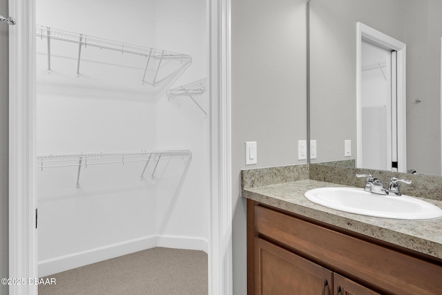 906 Coral Reef Way, Daytona Beach, FL 32124 - bathroom with vanity and baseboards