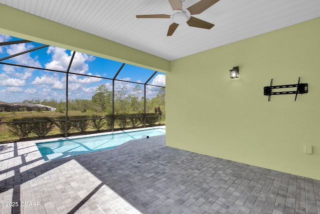 906 Coral Reef Way, Daytona Beach, FL 32124 - swimming pool featuring a patio, a ceiling fan, and glass enclosure
