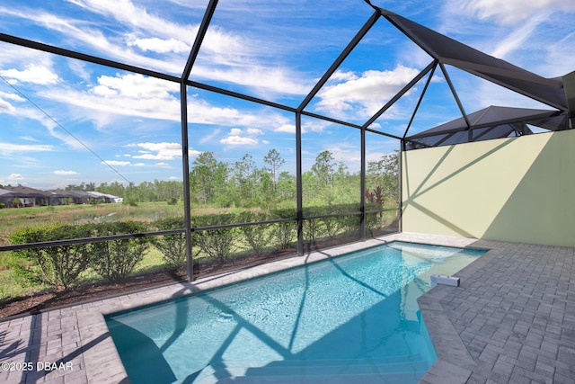 906 Coral Reef Way, Daytona Beach, FL 32124 - outdoor pool featuring glass enclosure and a patio