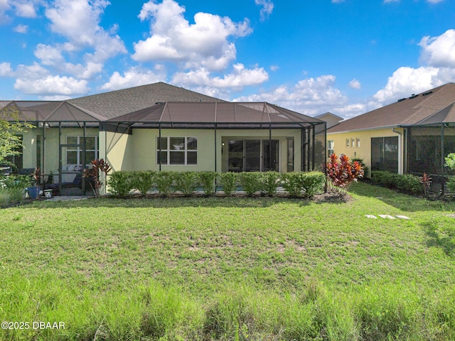 906 Coral Reef Way, Daytona Beach, FL 32124 - rear view of property featuring a yard, stucco siding, and a lanai
