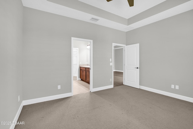 906 Coral Reef Way, Daytona Beach, FL 32124 - unfurnished bedroom with light colored carpet and connected bathroom