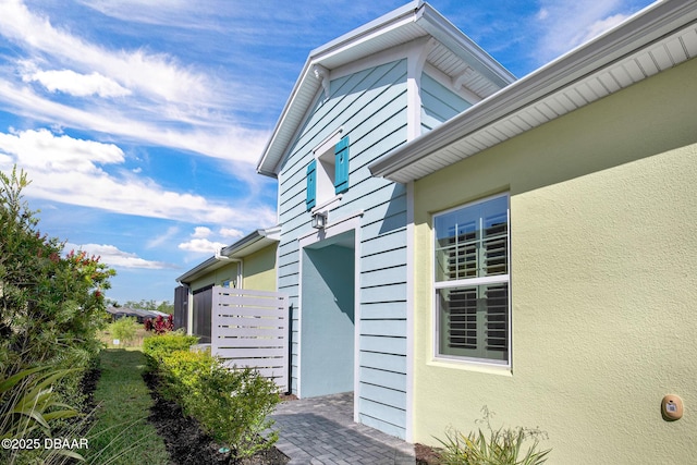 906 Coral Reef Way, Daytona Beach, FL 32124 - view of side of property with stucco siding