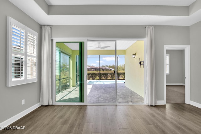 906 Coral Reef Way, Daytona Beach, FL 32124 - spare room with wood finished floors, healthy amount of natural light, and a ceiling fan
