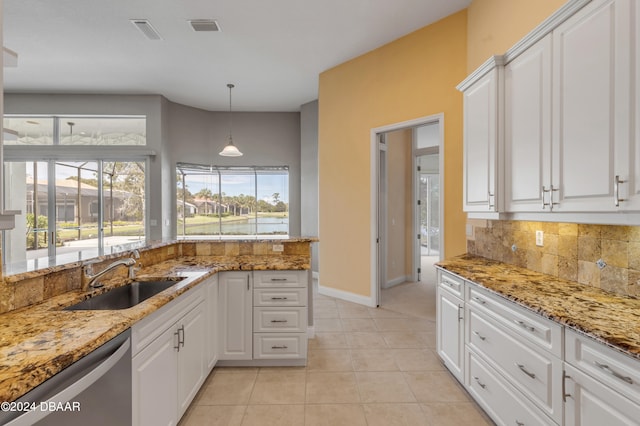 kitchen featuring dishwasher, white cabinetry, pendant lighting, and sink