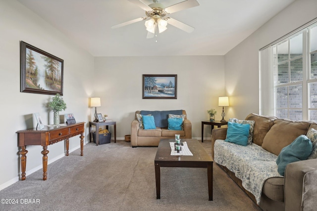 living room with carpet flooring and ceiling fan