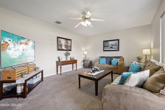 living room featuring carpet flooring and ceiling fan