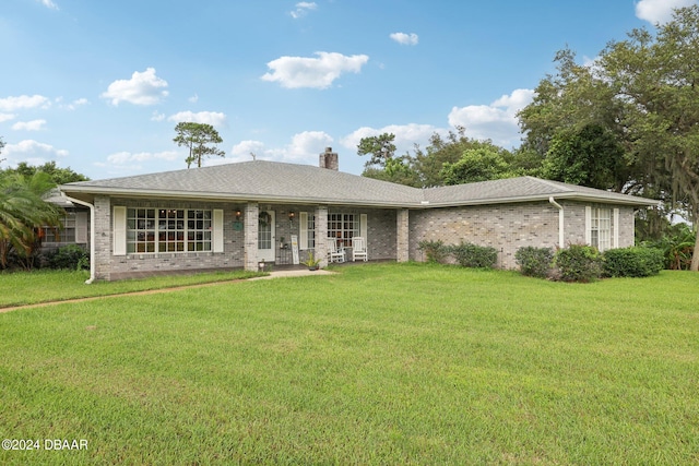 single story home with a front yard